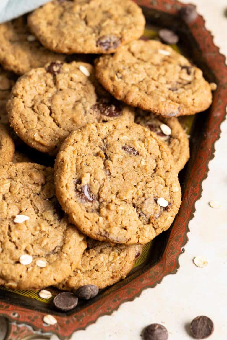Sourdough chocolate chip oatmeal cookies on a tray.