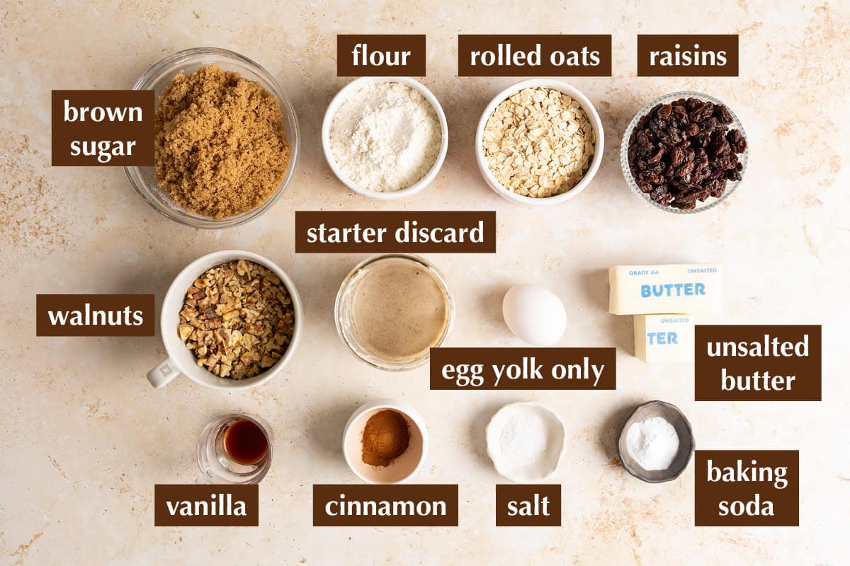 Ingredients for sourdough oatmeal cookies with raisins and walnuts.