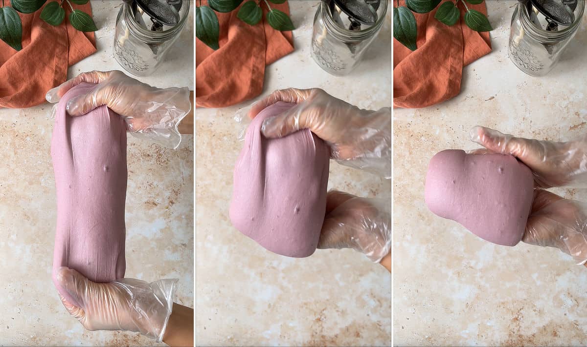 Stretching and folding sourdough purple sweet potato bread dough.