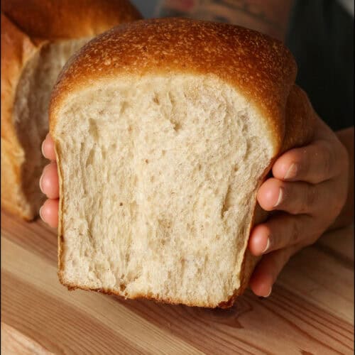 The soft interior of apple sourdough bread.