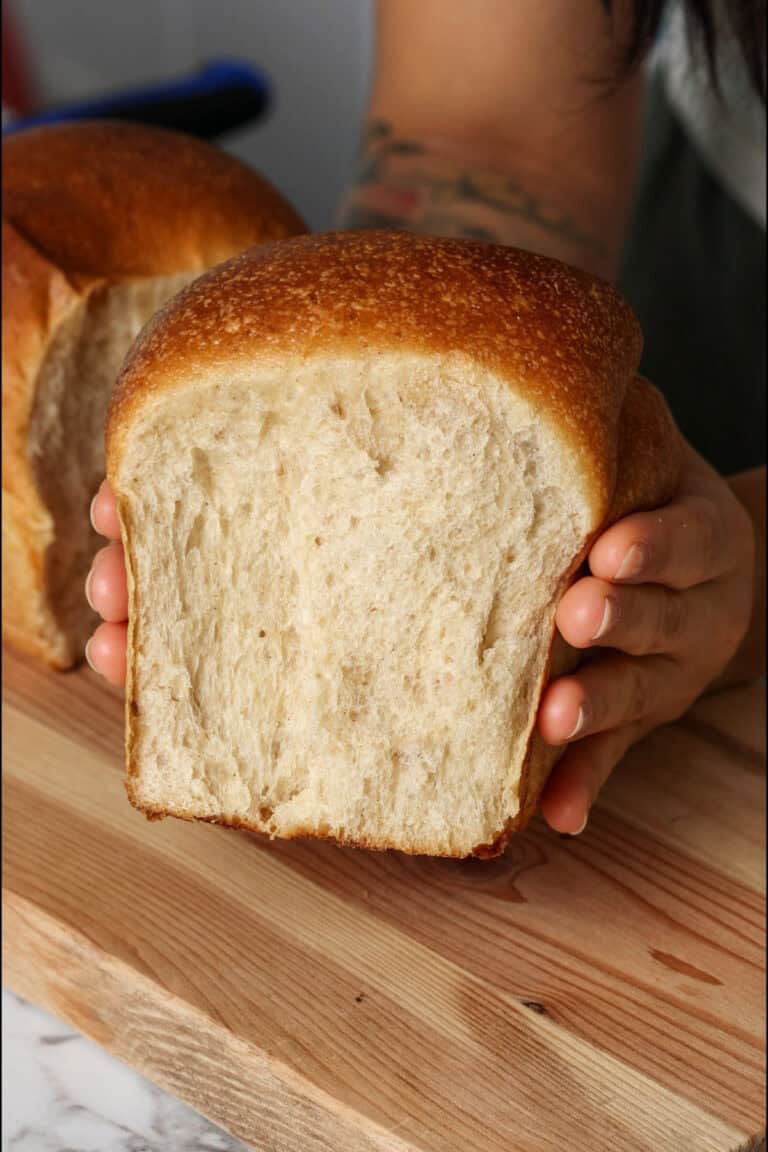 The soft interior of apple sourdough bread.