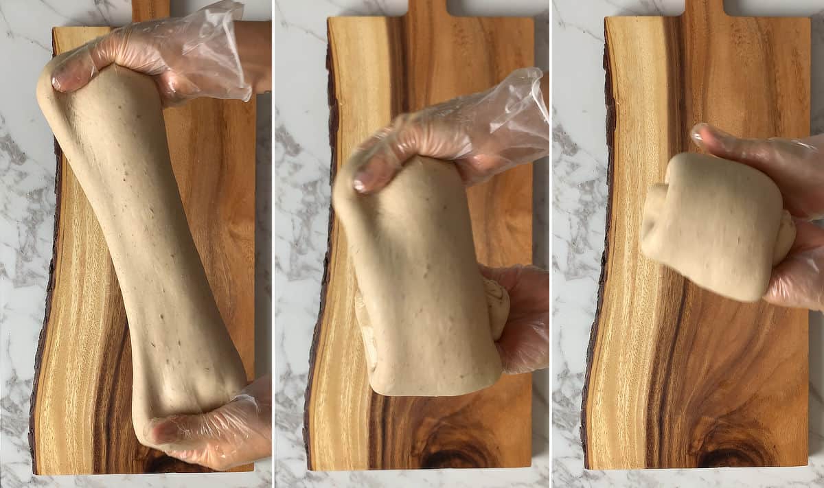 Stretching and folding sourdough apple bread dough.